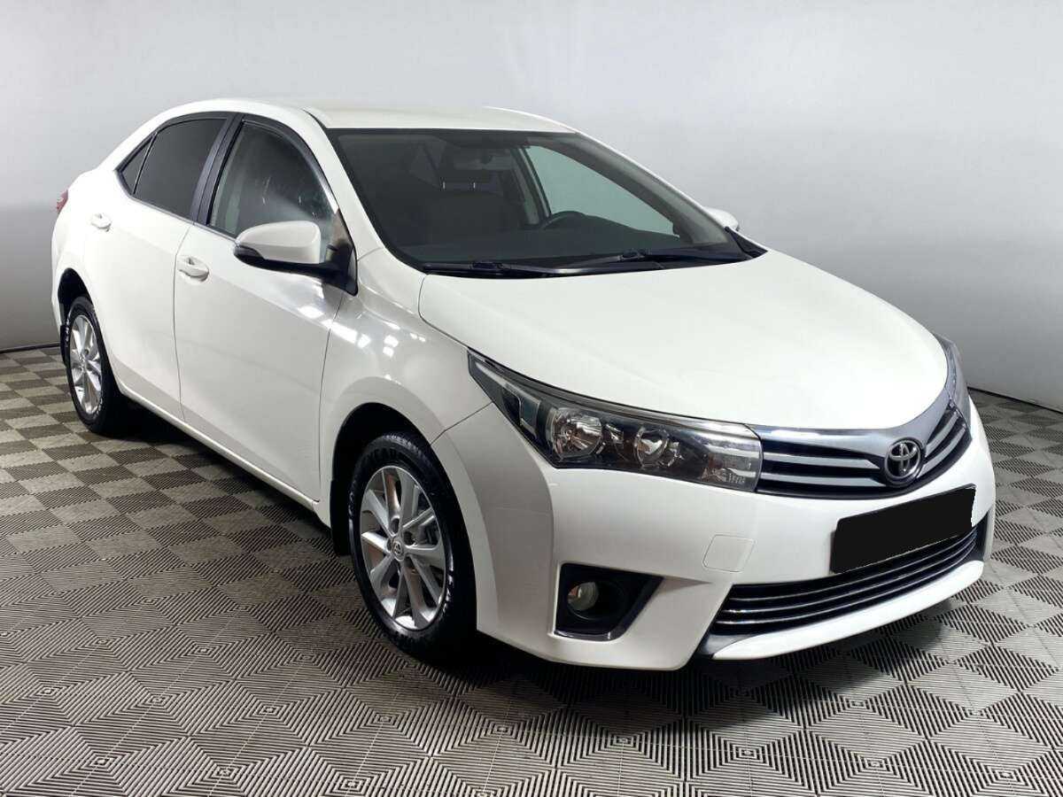 Toyota Corolla с пробегом — 2013 год. Фото: #2