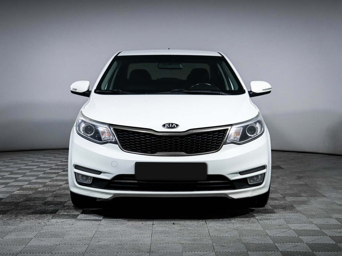 Kia Rio с пробегом — 2015 год. Фото: #1