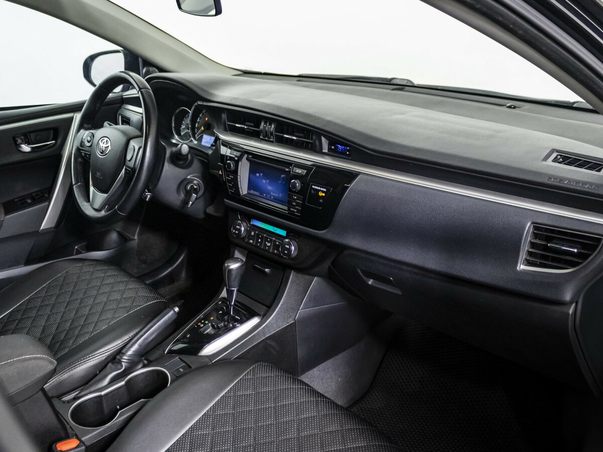 Toyota Corolla с пробегом — 2013 год. Фото: #6