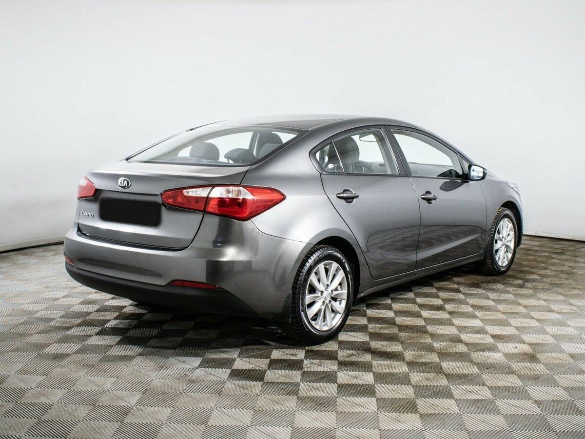 Kia Cerato с пробегом — 2015 год. Фото: #3