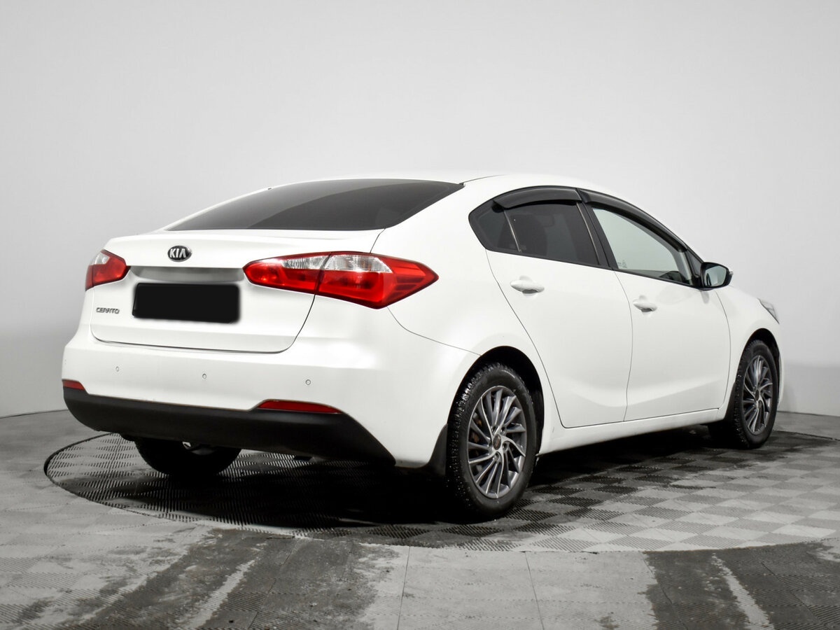 Kia Cerato с пробегом — 2015 год. Фото: #3