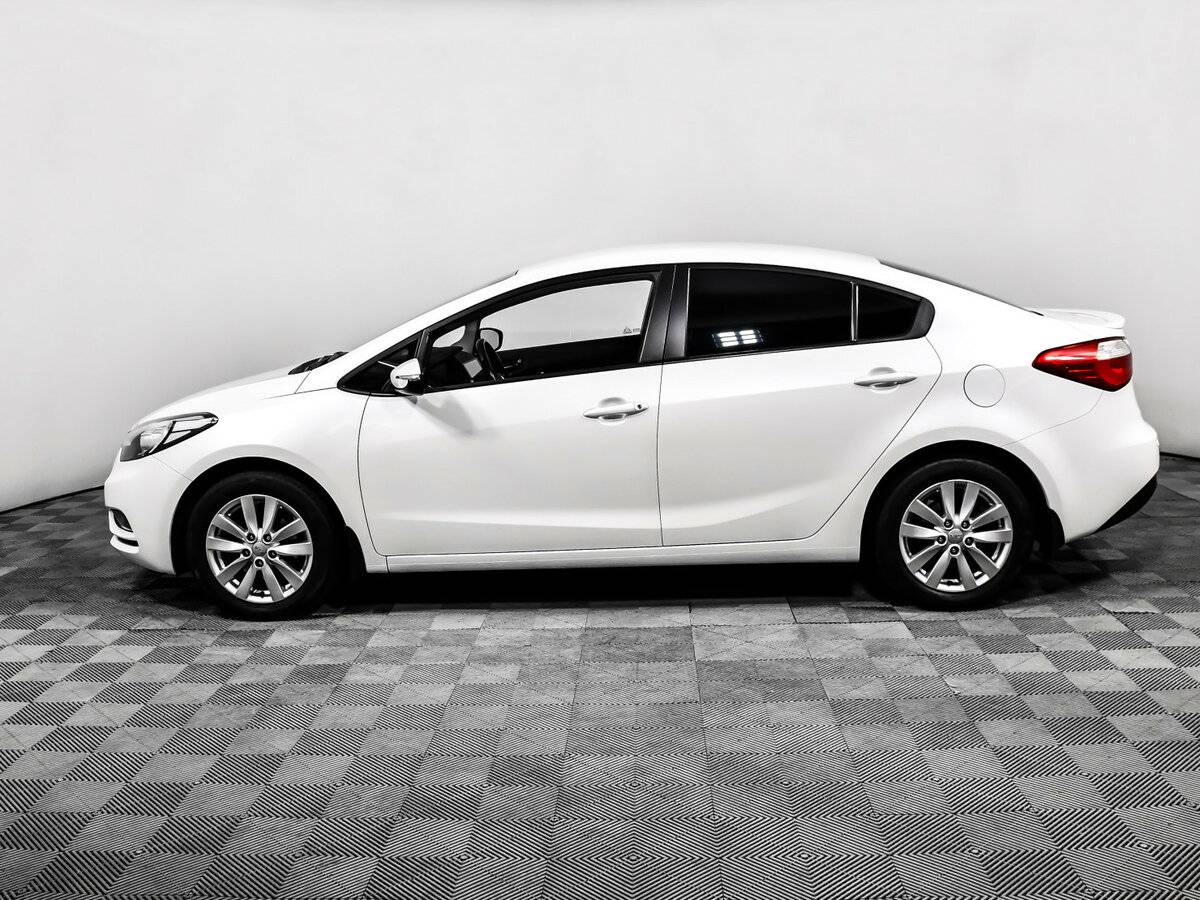 Kia Cerato с пробегом — 2013 год. Фото: #7