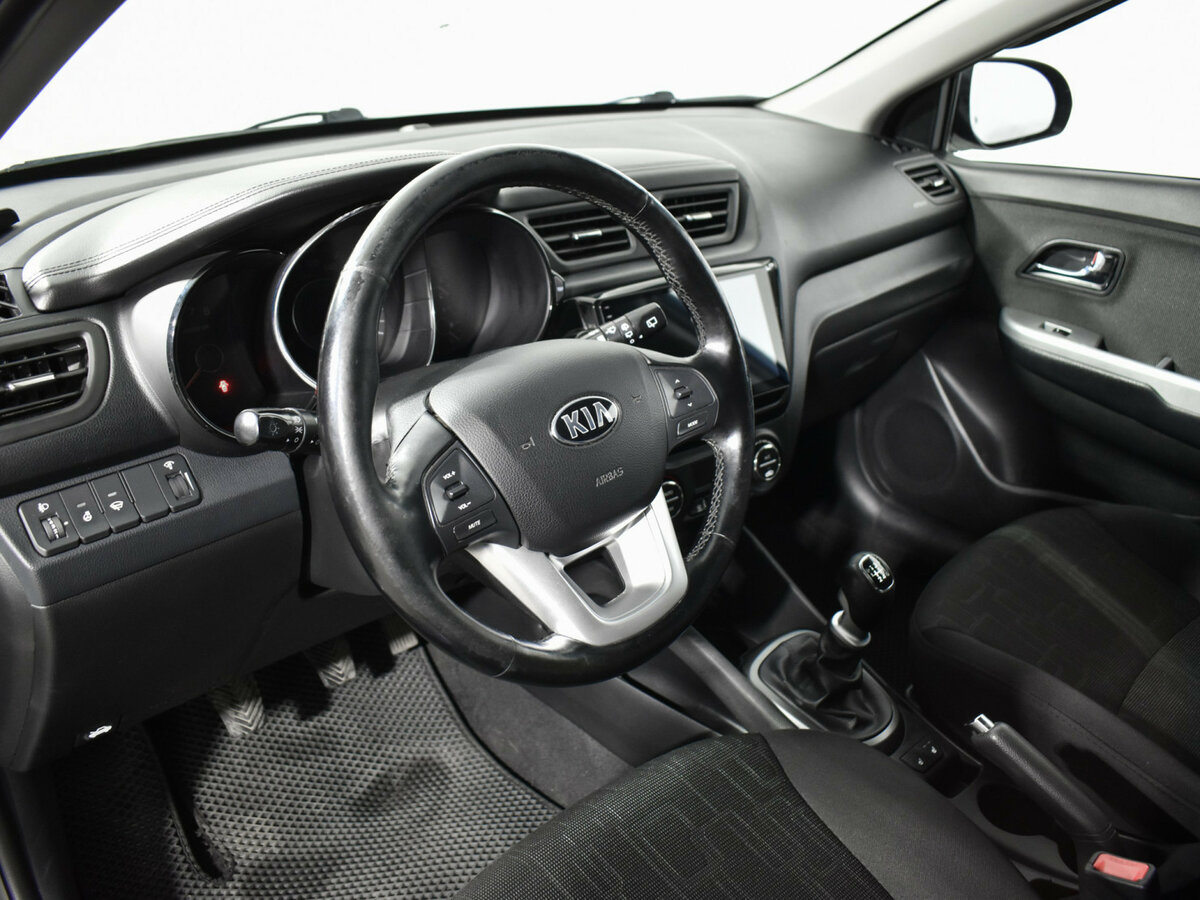 Kia Rio с пробегом — 2014 год. Фото: #8