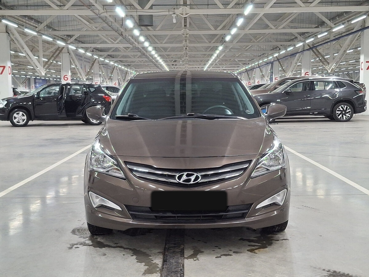 Hyundai Solaris с пробегом — 2015 год. Фото: #1