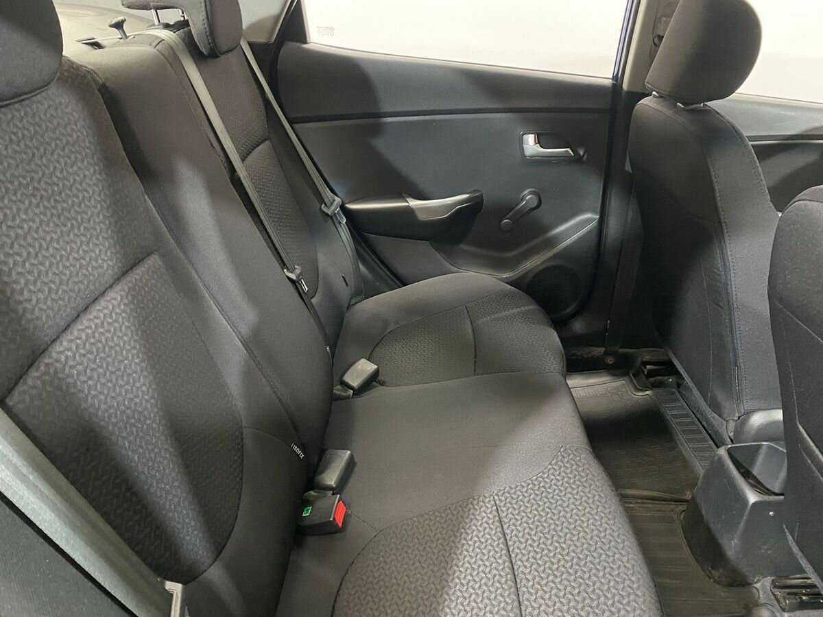 Kia Rio с пробегом — 2013 год. Фото: #10
