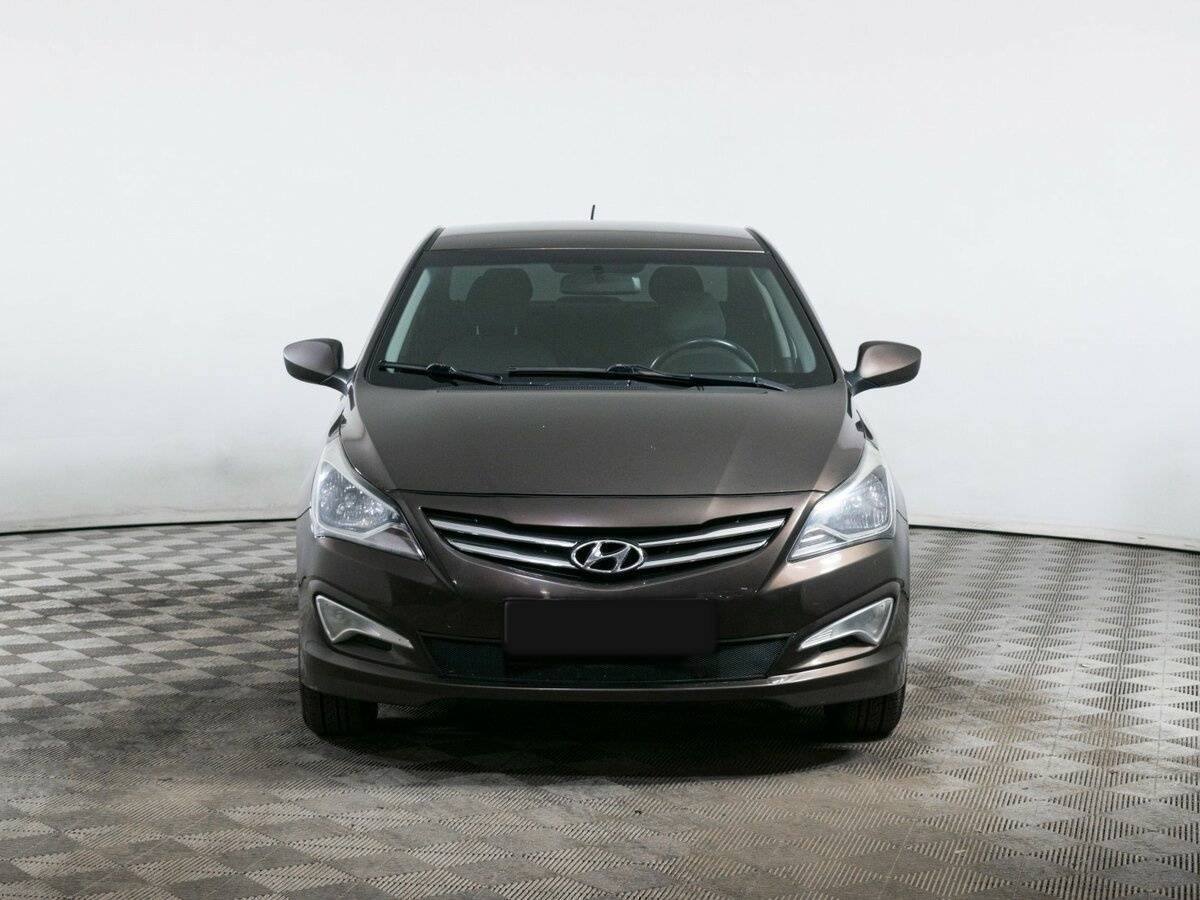 Hyundai Solaris с пробегом — 2014 год. Фото: #1
