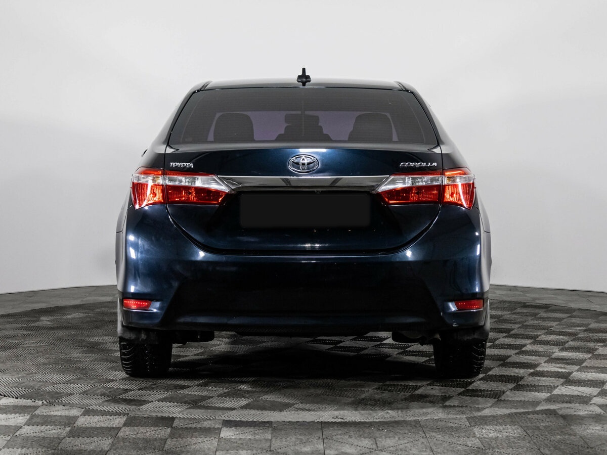 Toyota Corolla с пробегом — 2014 год. Фото: #4