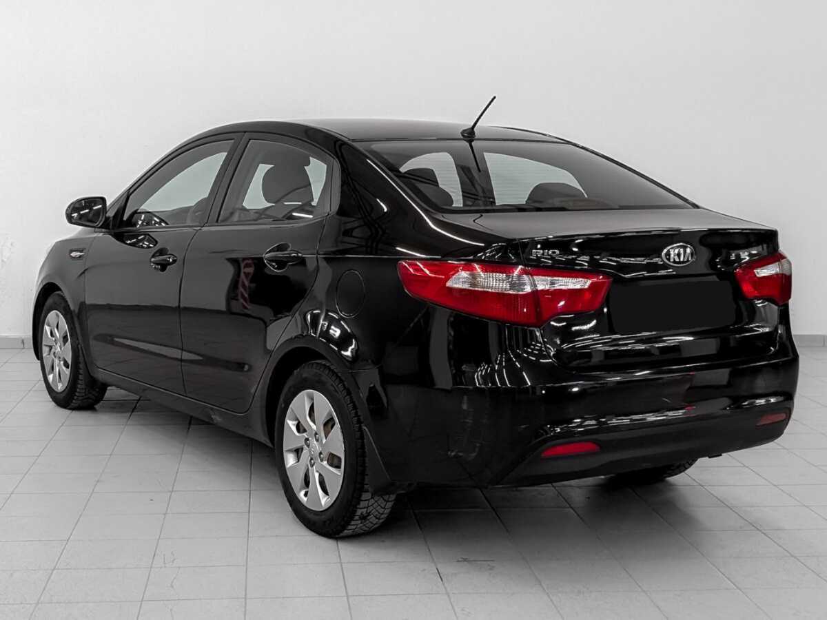 Kia Rio с пробегом — 2013 год. Фото: #6