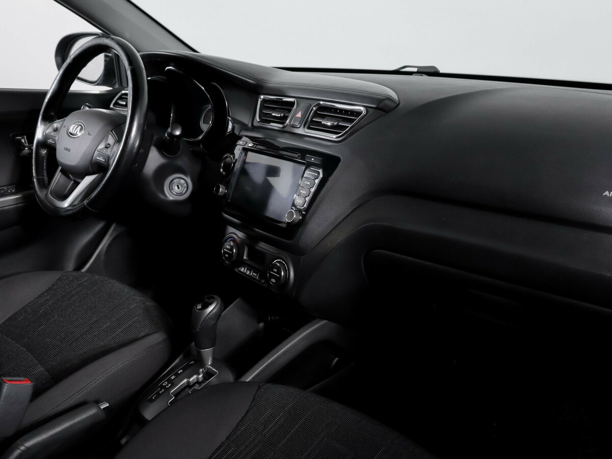 Kia Rio с пробегом — 2013 год. Фото: #6