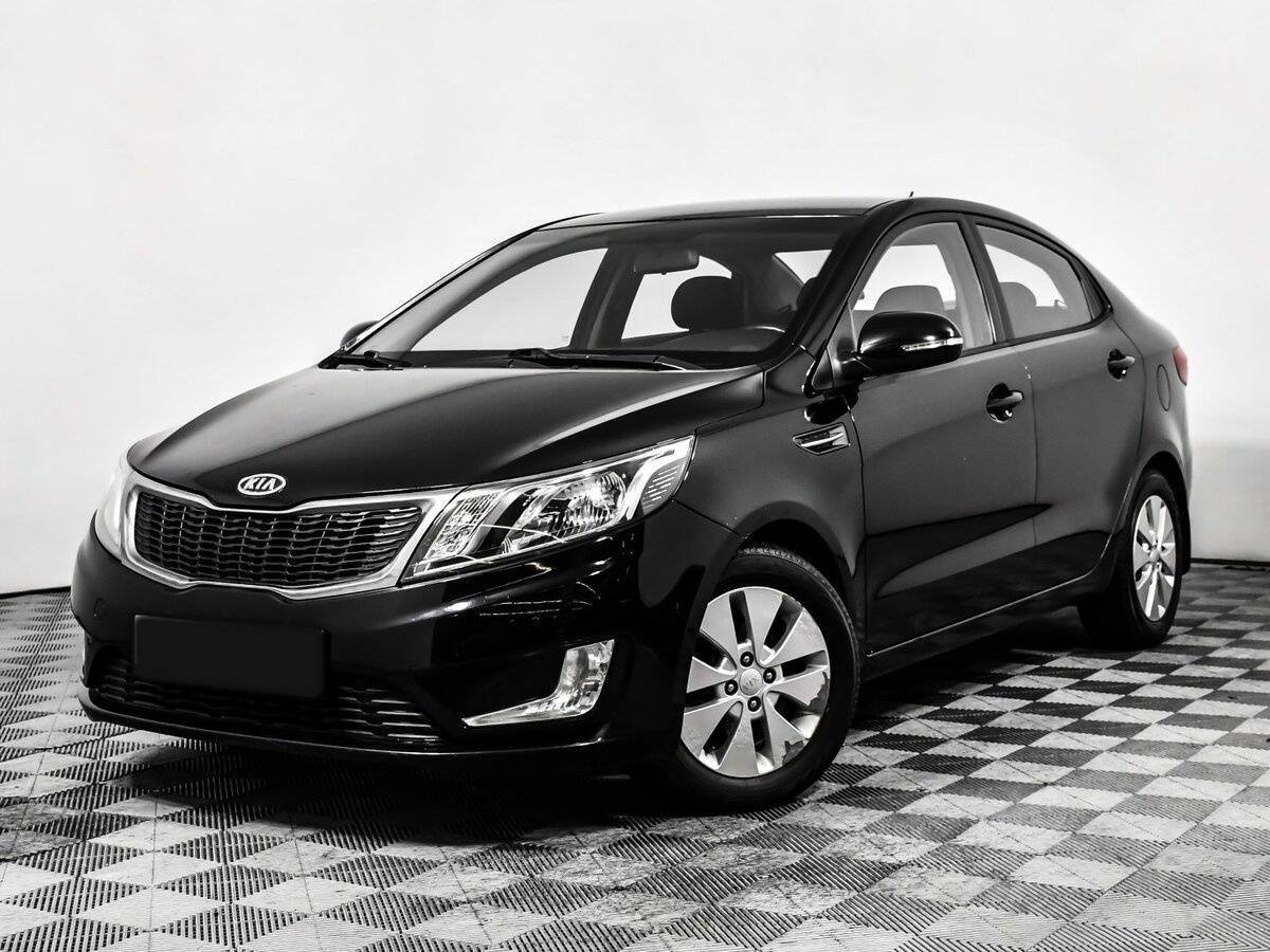 Kia Rio с пробегом — 2012 год. Фото: #0