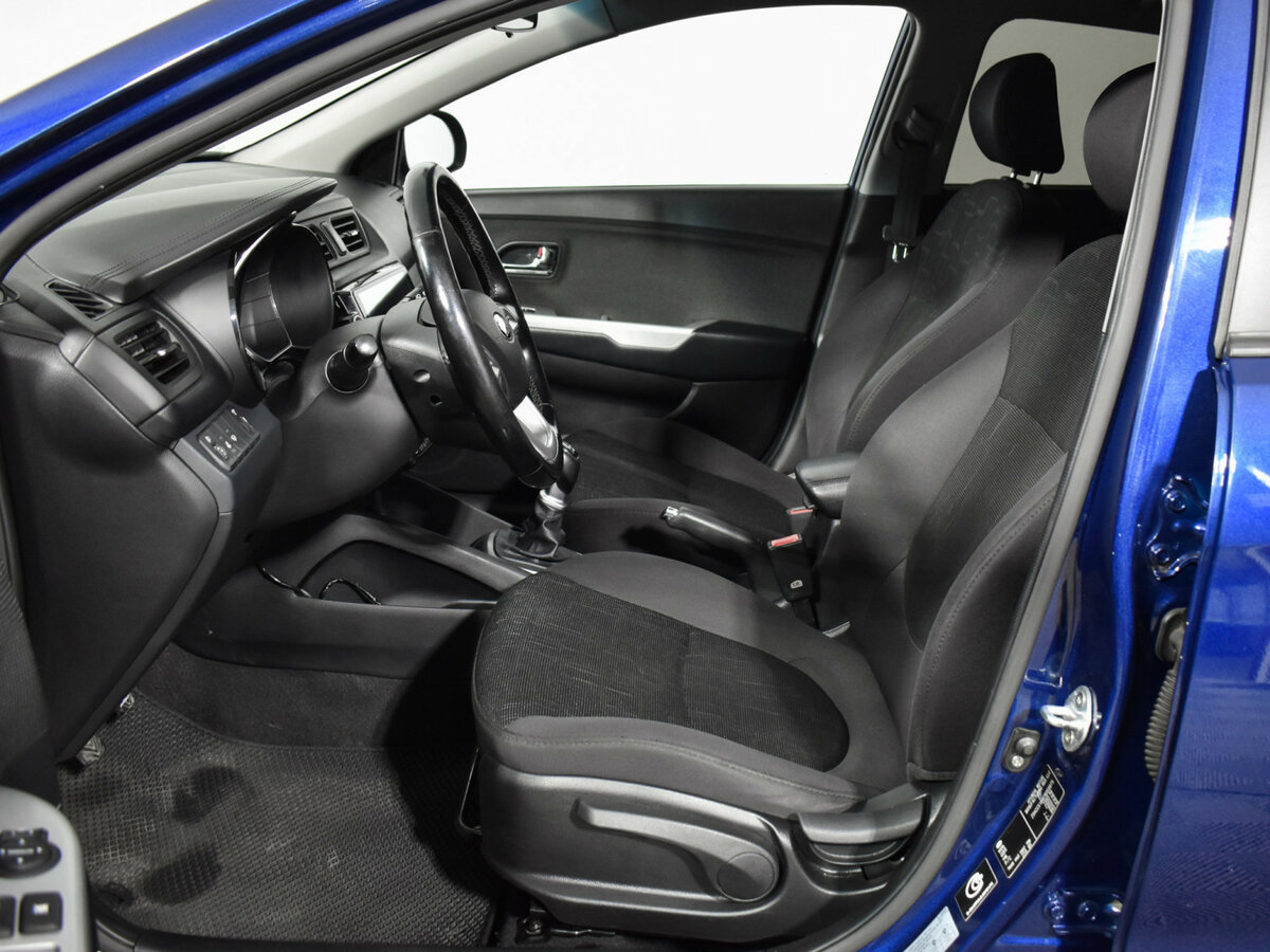 Kia Rio с пробегом — 2014 год. Фото: #9