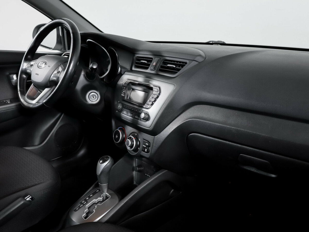 Kia Rio с пробегом — 2014 год. Фото: #6