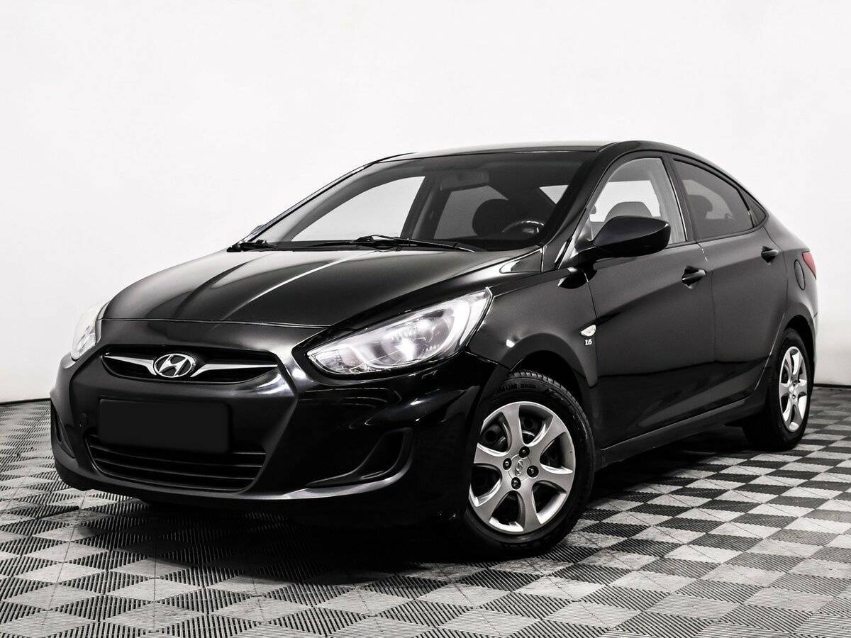 Hyundai Solaris с пробегом — 2012 год. Фото: #0