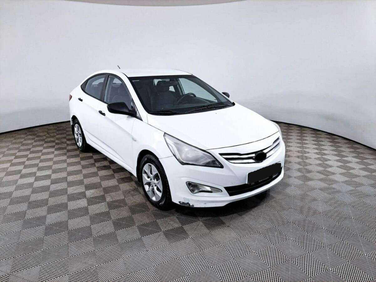 Hyundai Solaris с пробегом — 2014 год. Фото: #2