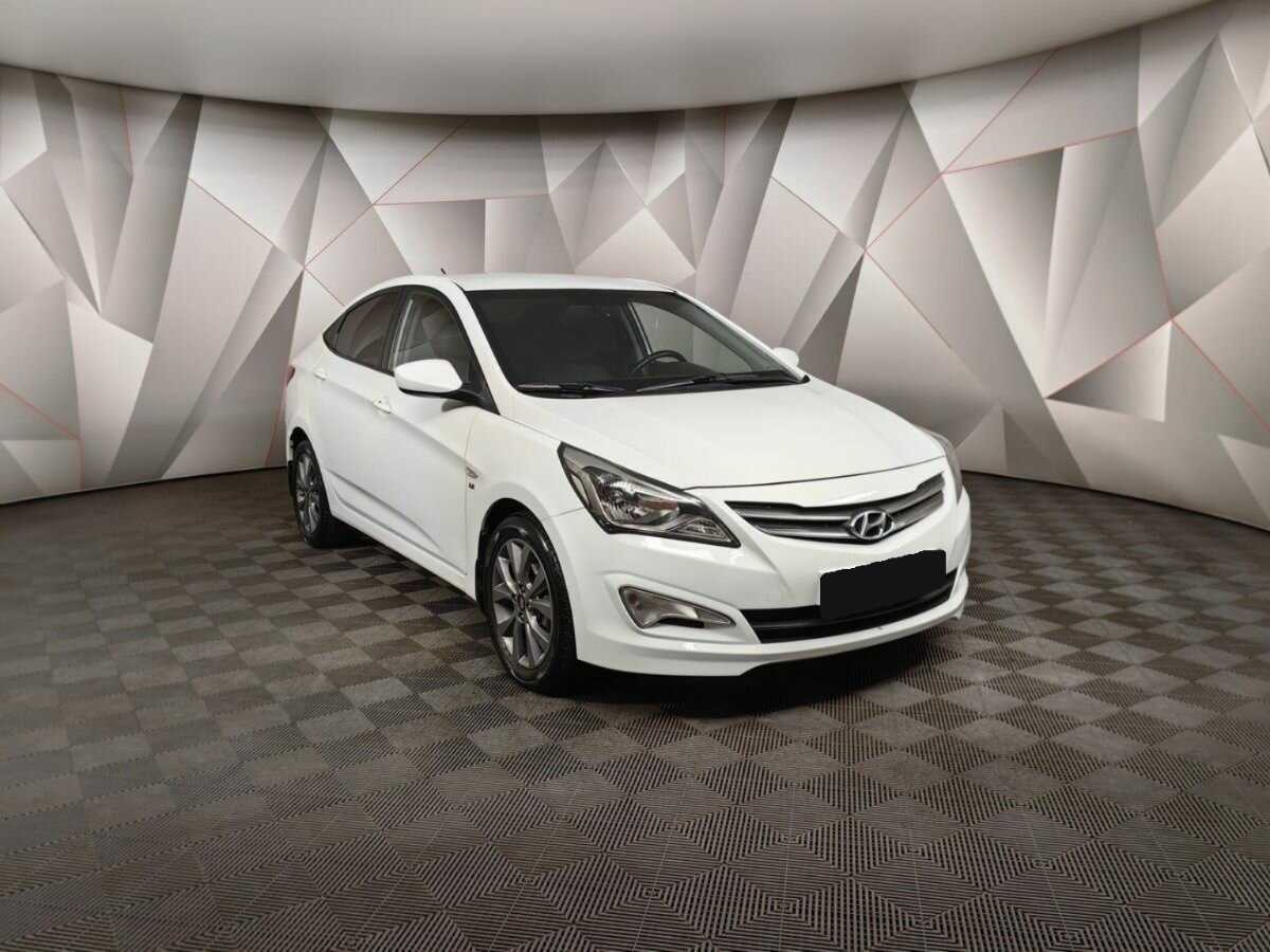 Hyundai Solaris с пробегом — 2014 год. Фото: #2