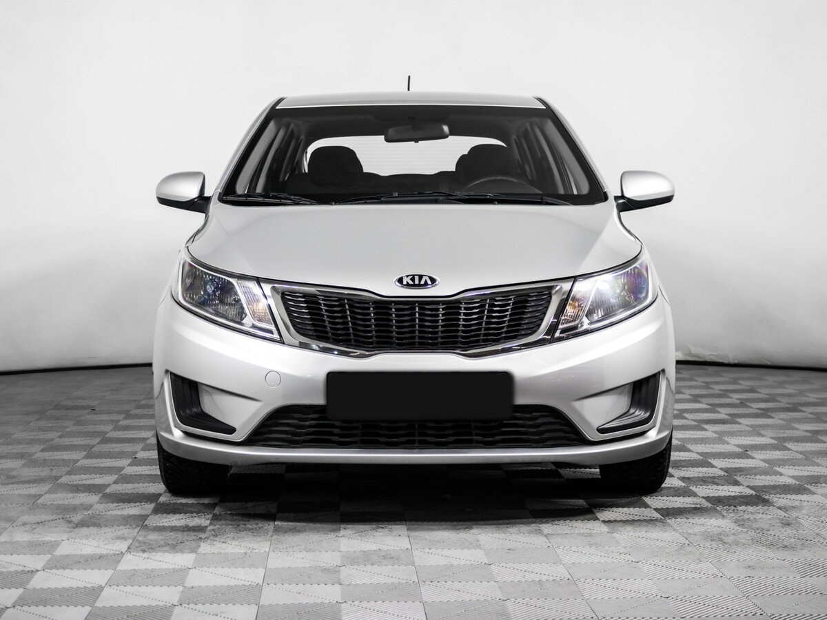 Kia Rio с пробегом — 2014 год. Фото: #1