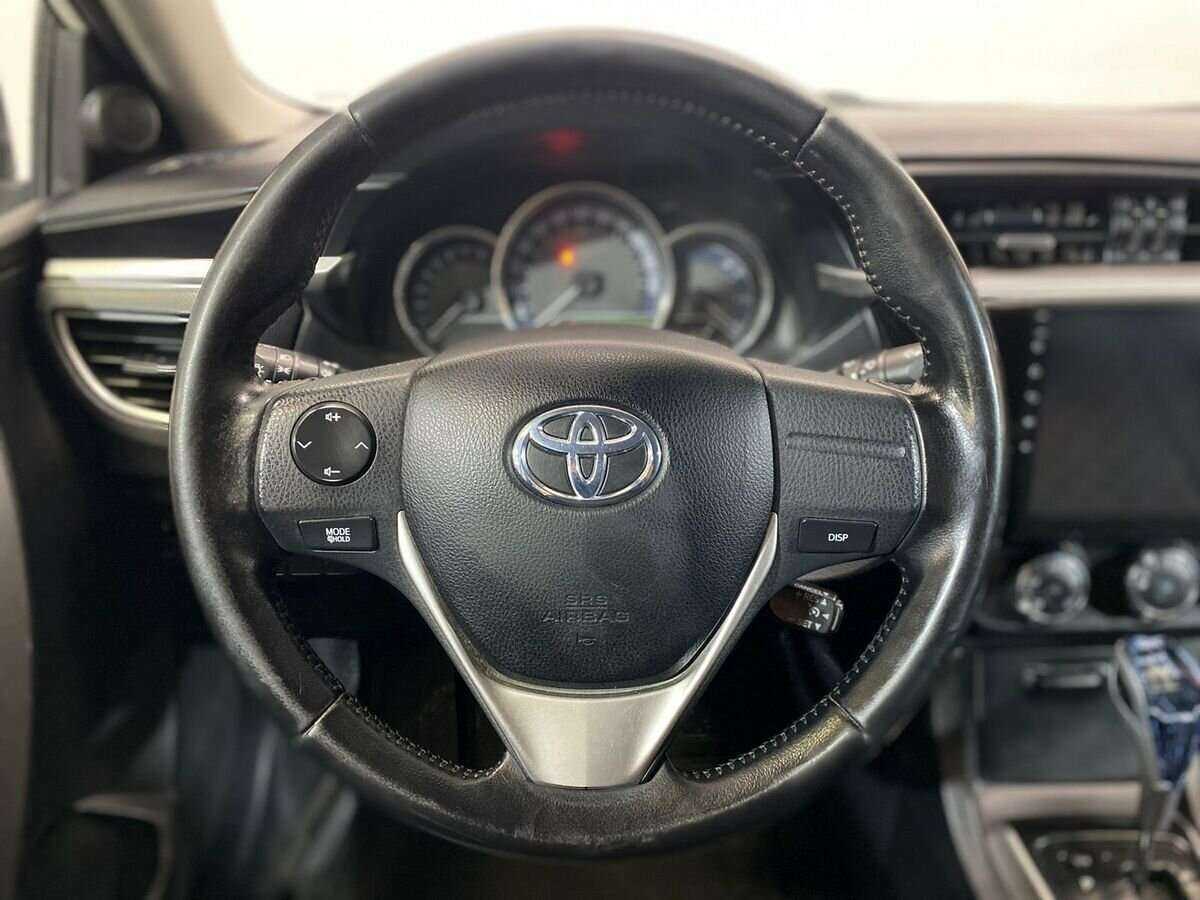 Toyota Corolla с пробегом — 2014 год. Фото: #11
