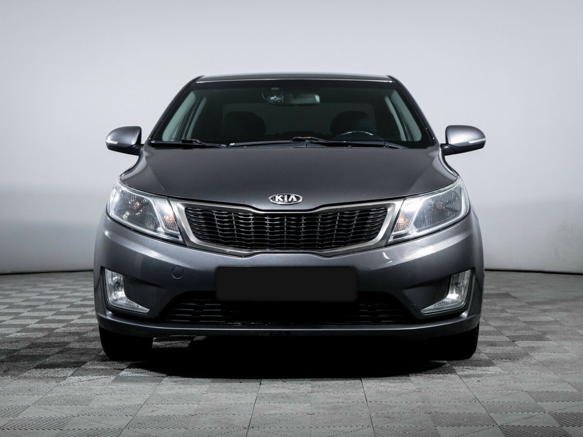 Kia Rio с пробегом — 2013 год. Фото: #1