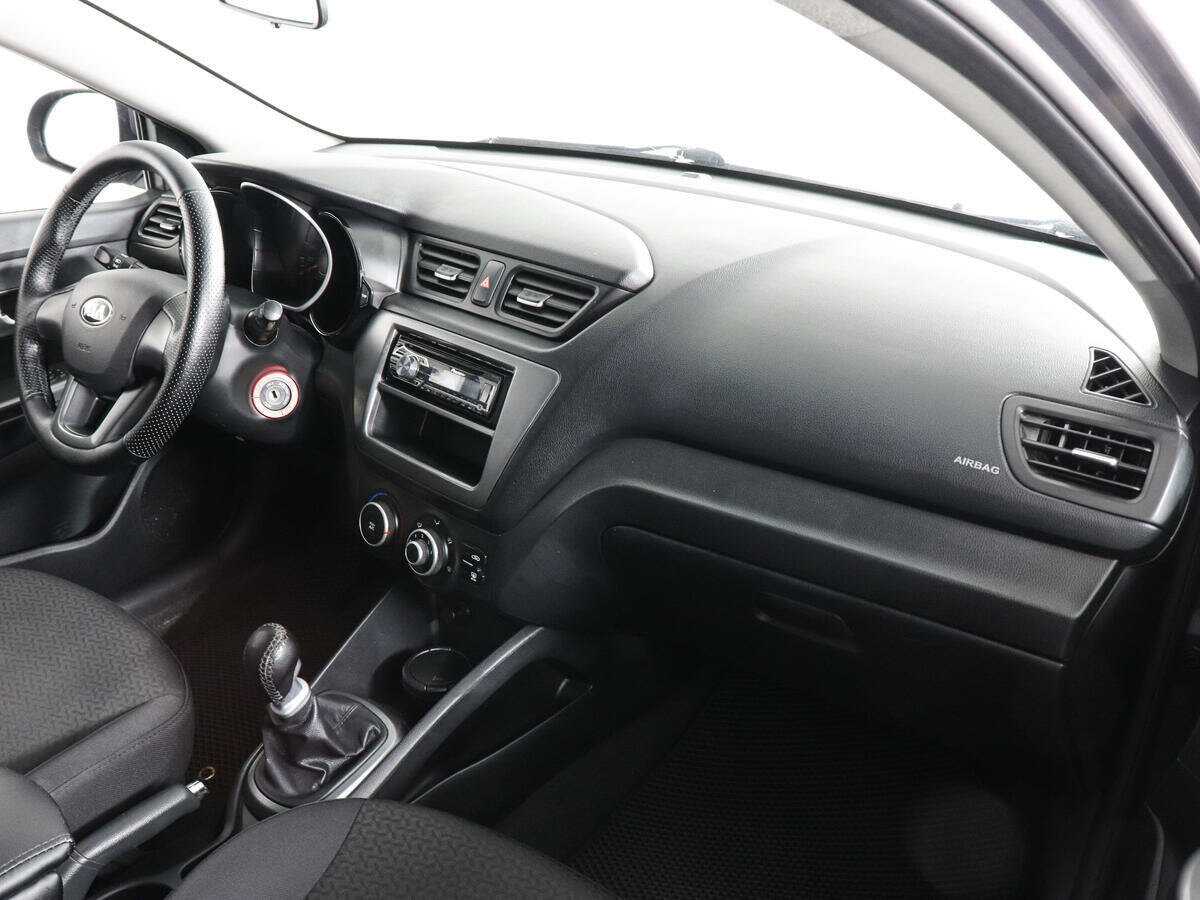 Kia Rio с пробегом — 2014 год. Фото: #5