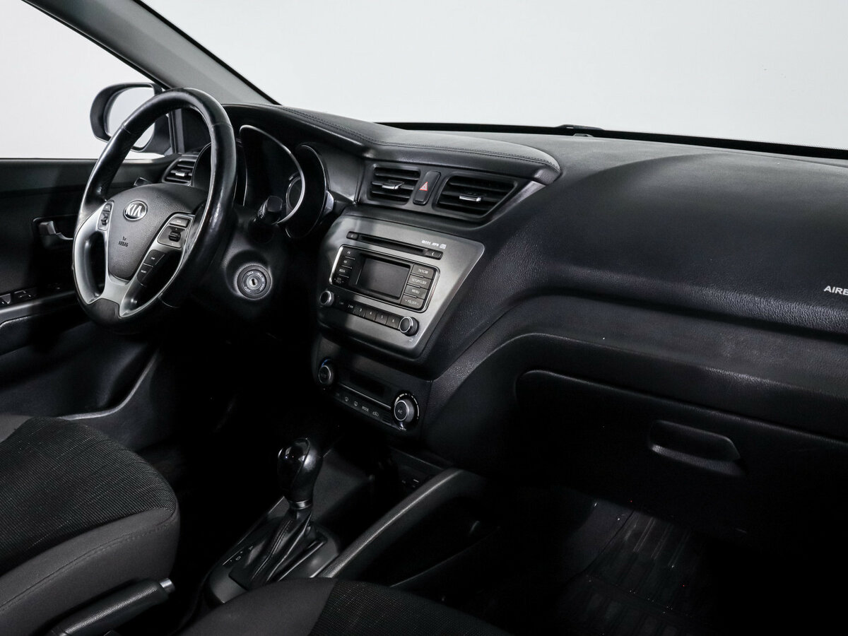 Kia Rio с пробегом — 2015 год. Фото: #6