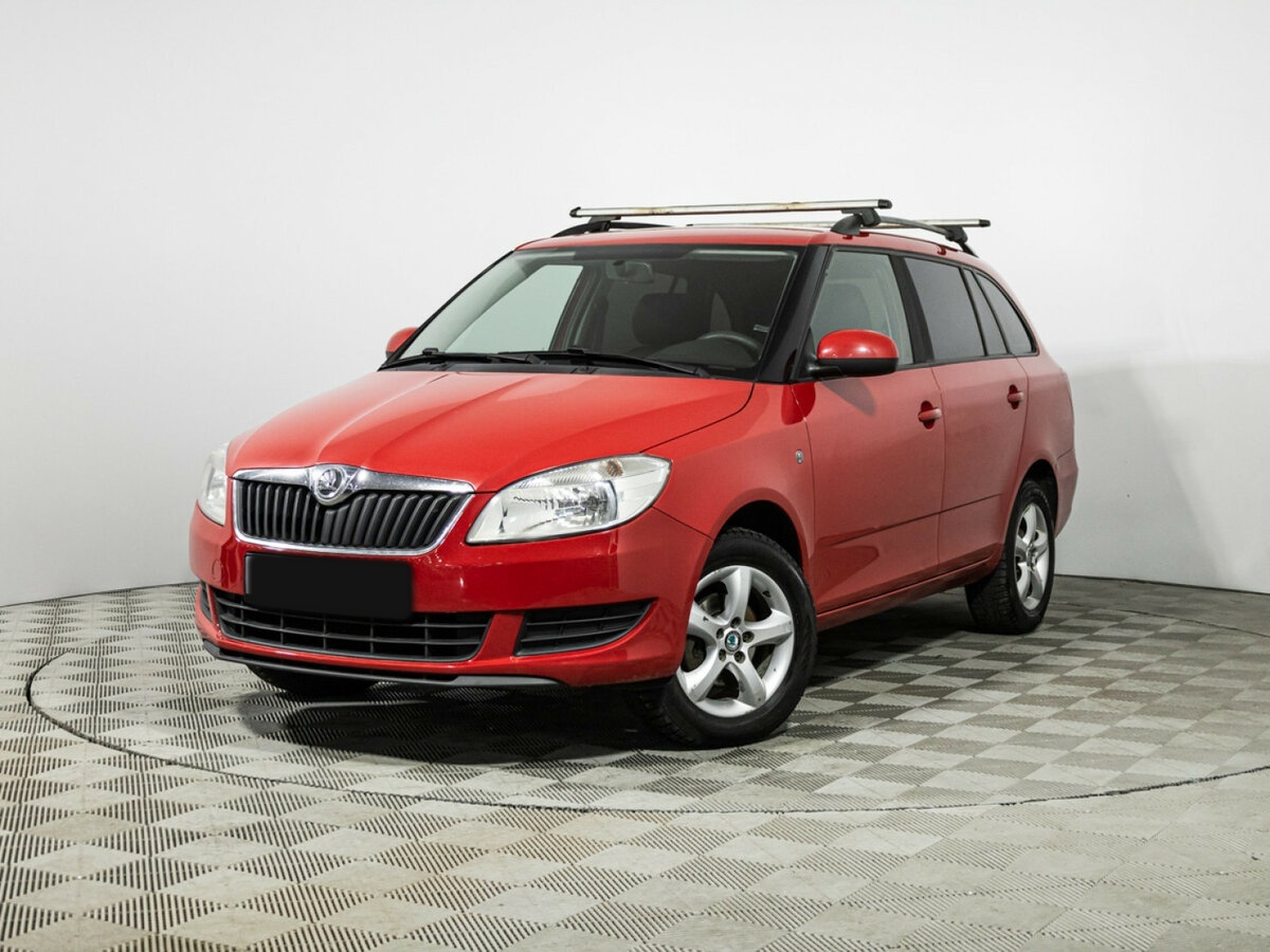 Skoda Fabia с пробегом — 2014 год. Фото: #0