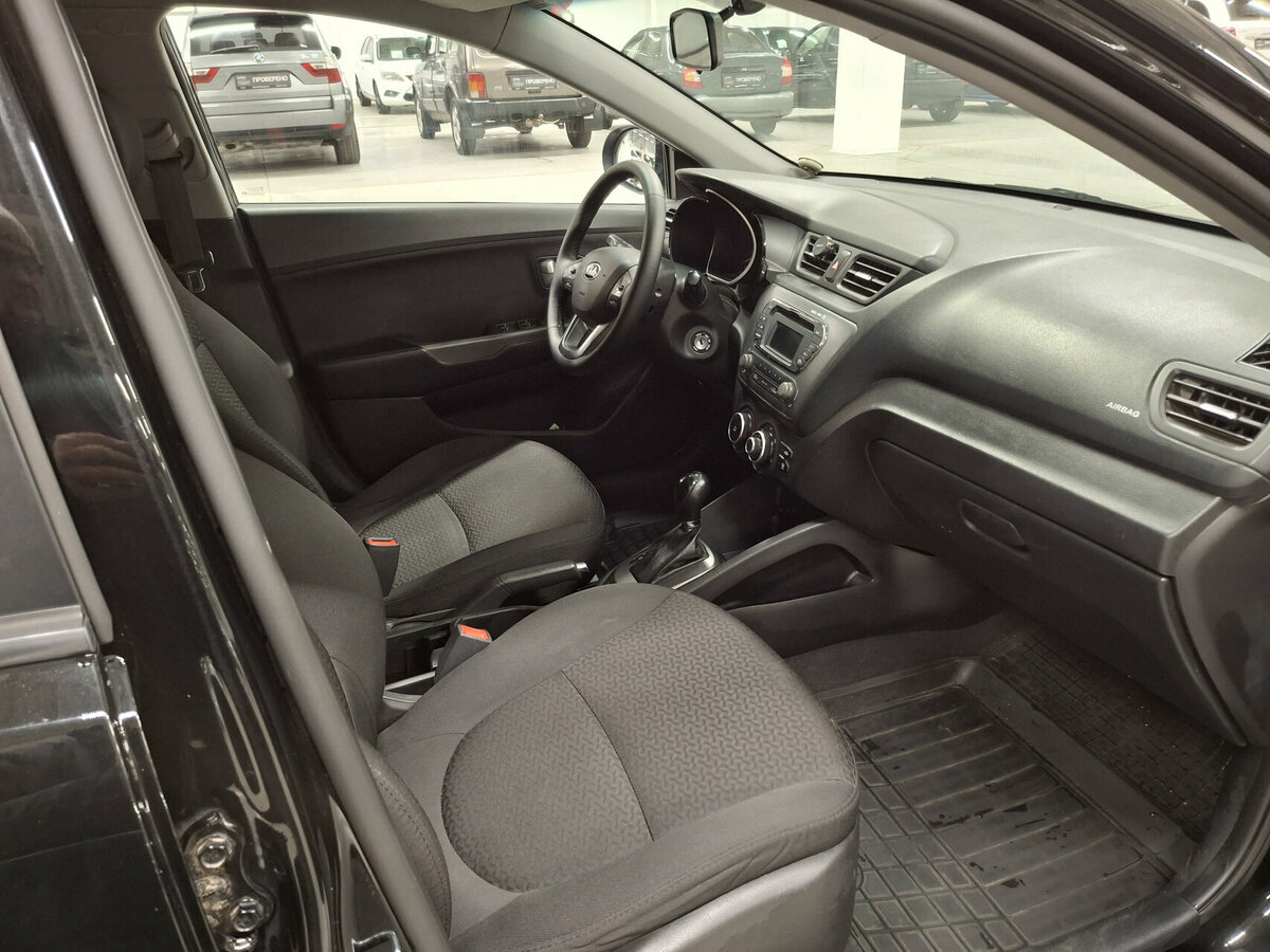 Kia Rio с пробегом — 2014 год. Фото: #9
