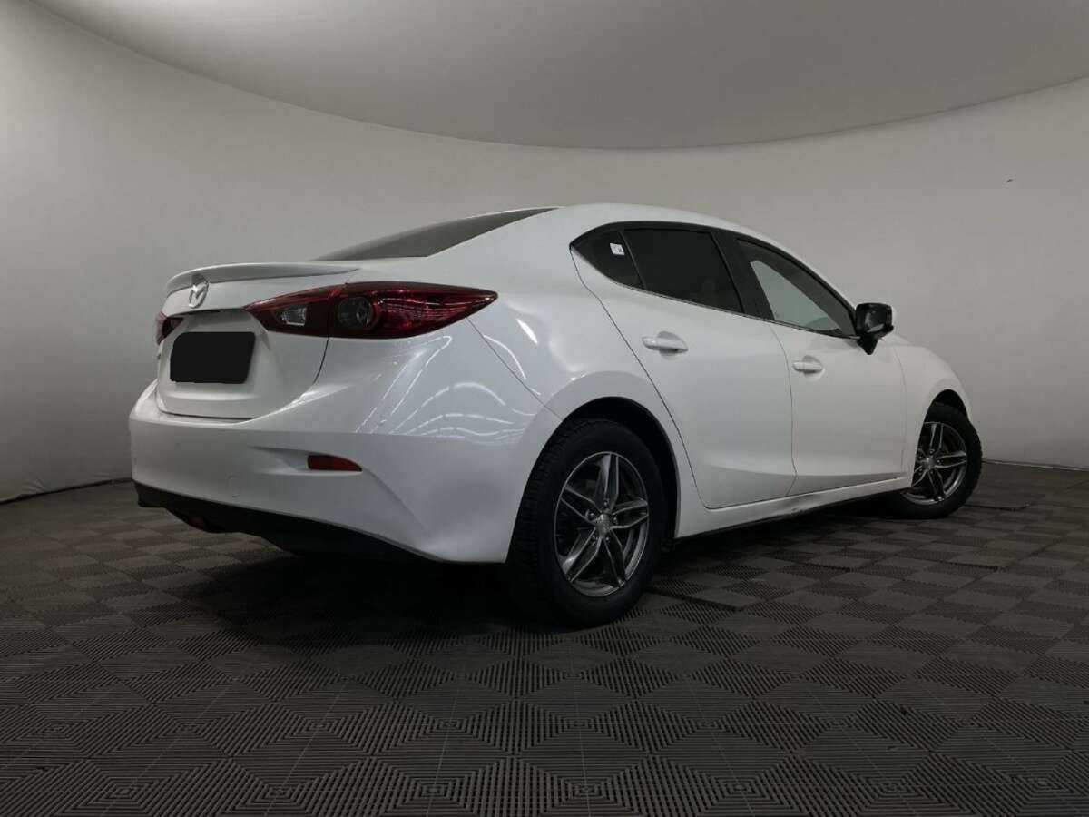 Mazda 3 с пробегом — 2014 год. Фото: #5