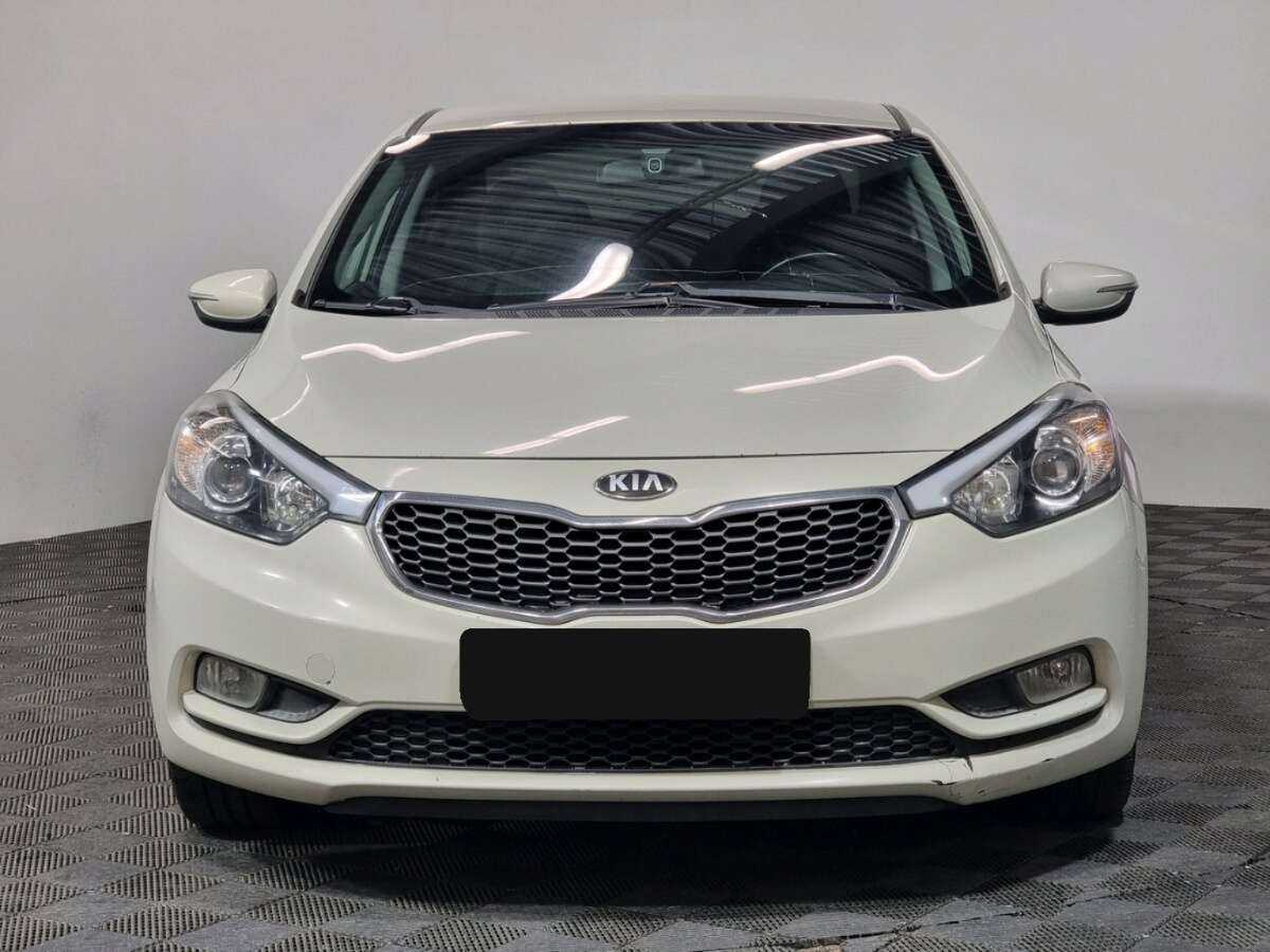 Kia Cerato с пробегом — 2014 год. Фото: #1