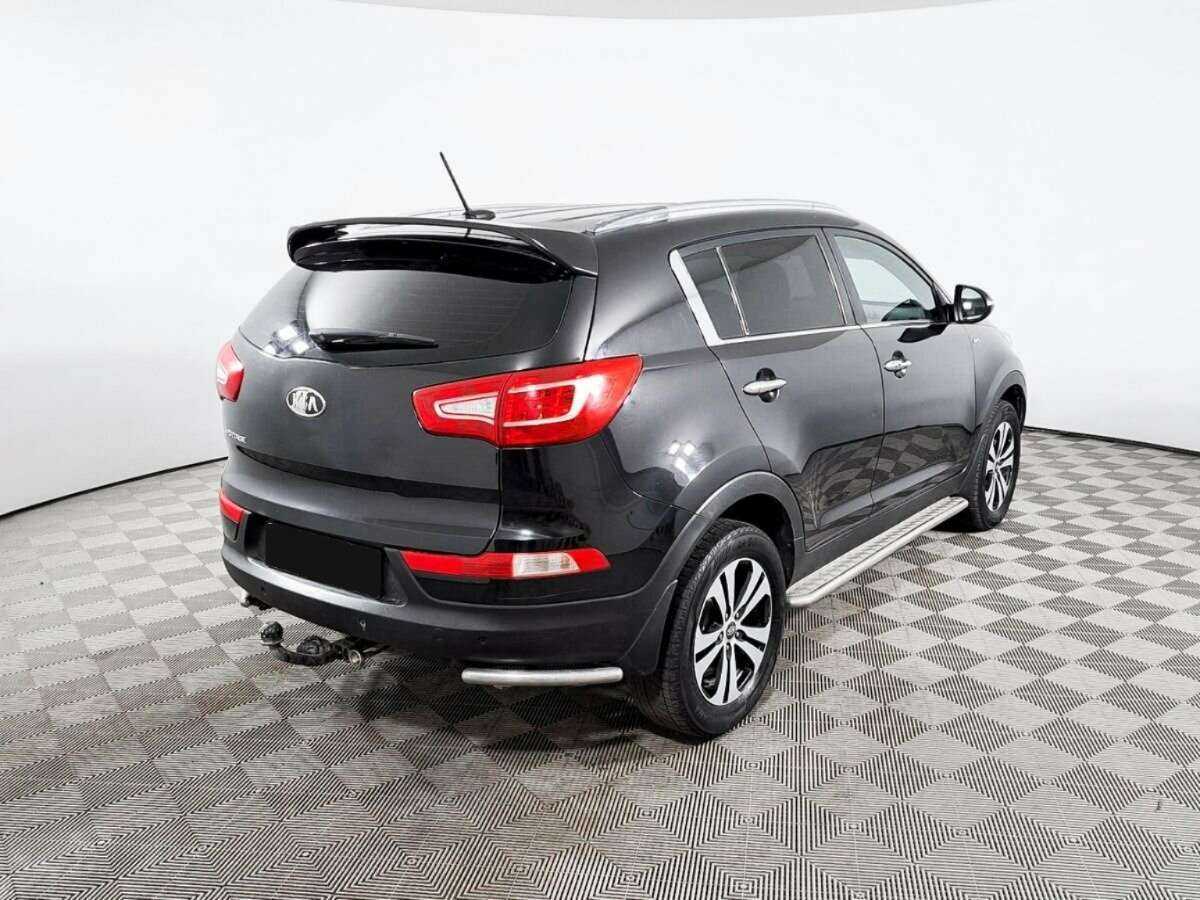 Kia Sportage с пробегом — 2012 год. Фото: #4