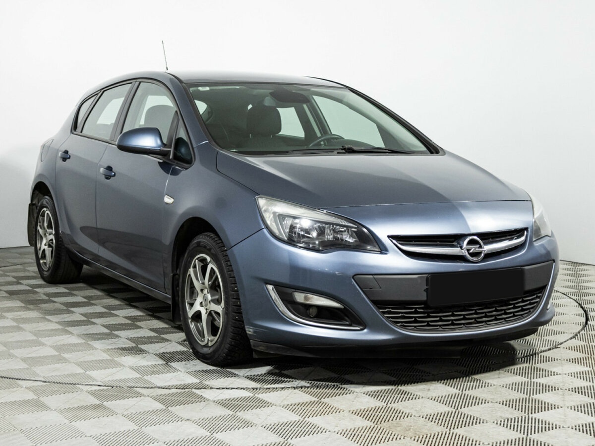 Opel Astra с пробегом — 2013 год. Фото: #2