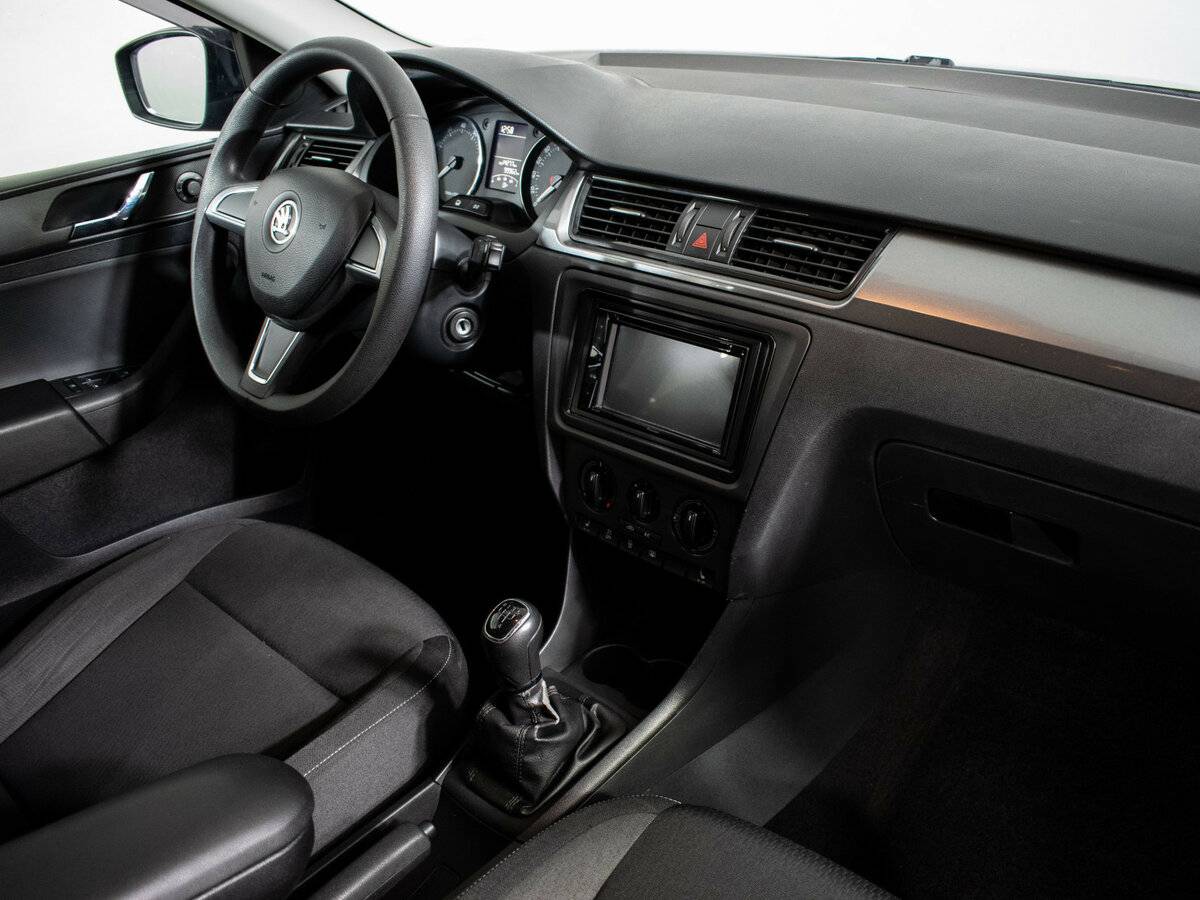 Skoda Rapid с пробегом — 2014 год. Фото: #8