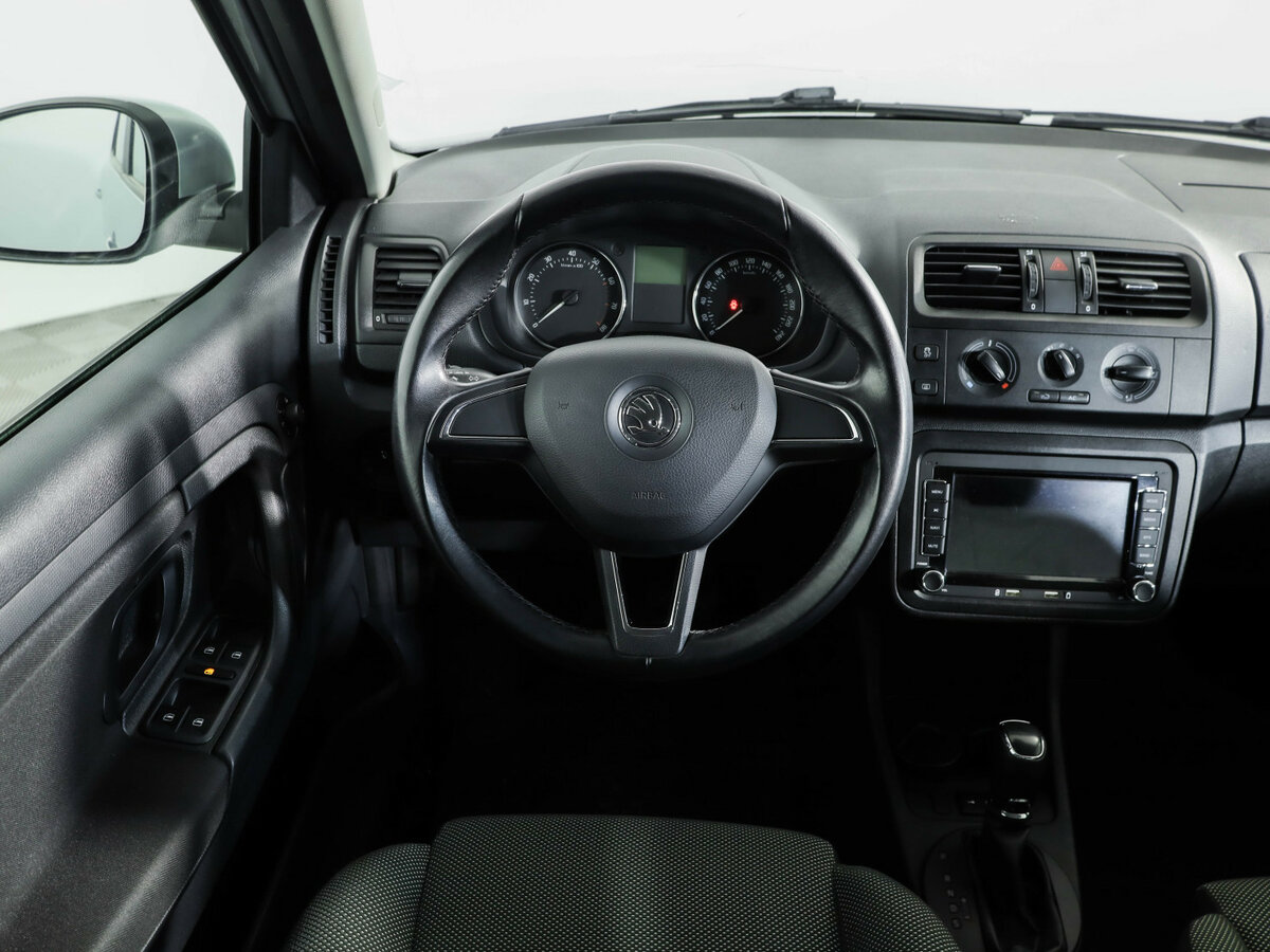 Skoda Fabia с пробегом — 2014 год. Фото: #8