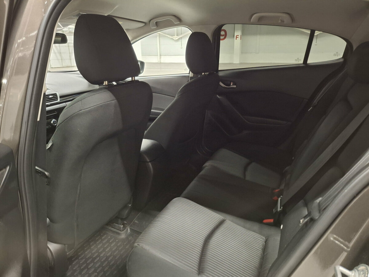 Mazda 3 с пробегом — 2014 год. Фото: #11