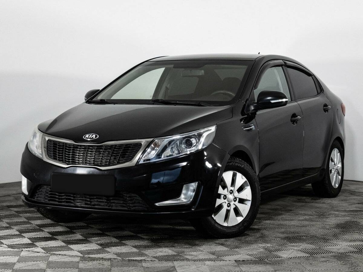 Kia Rio с пробегом — 2012 год. Фото: #0