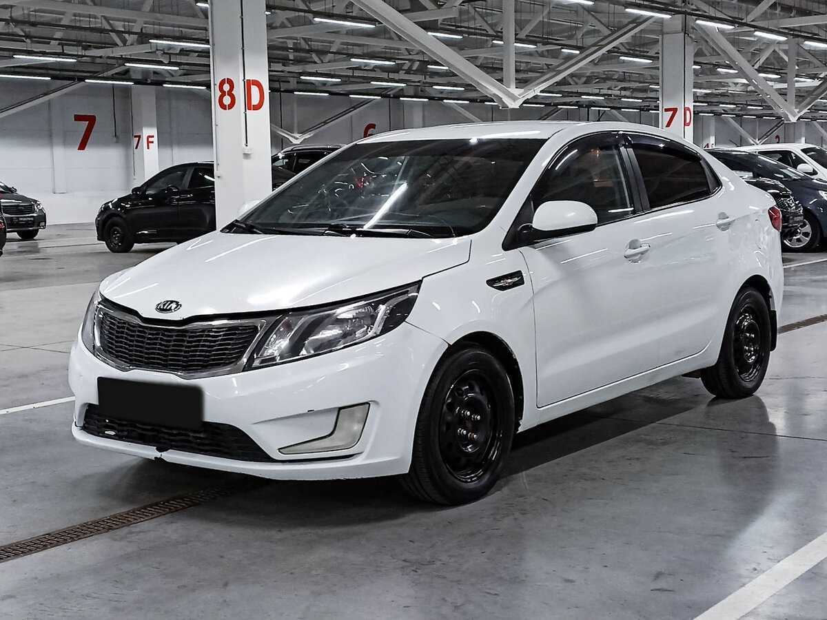 Kia Rio с пробегом — 2014 год. Фото: #0