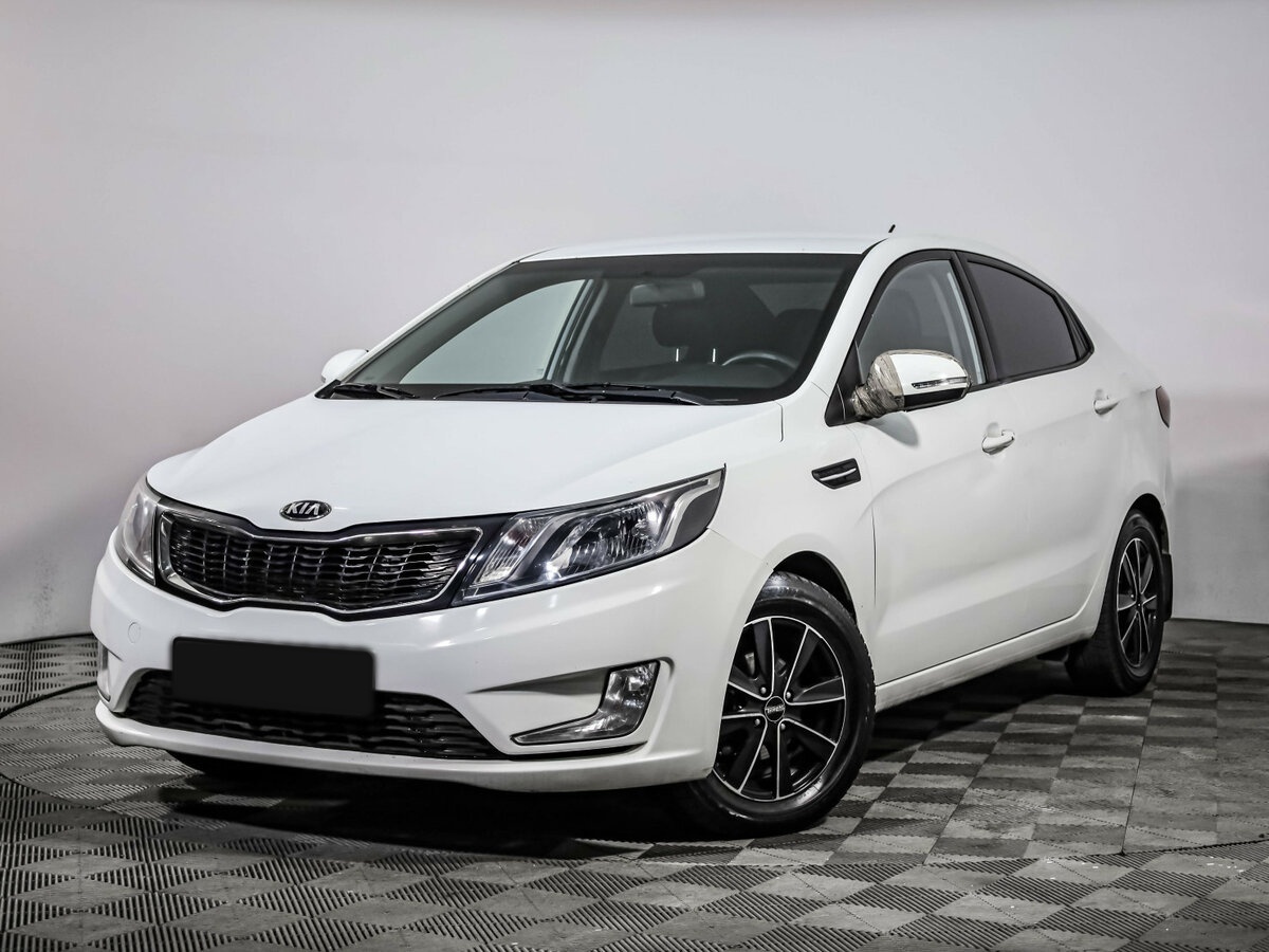 Kia Rio с пробегом — 2013 год. Посмотреть фото
