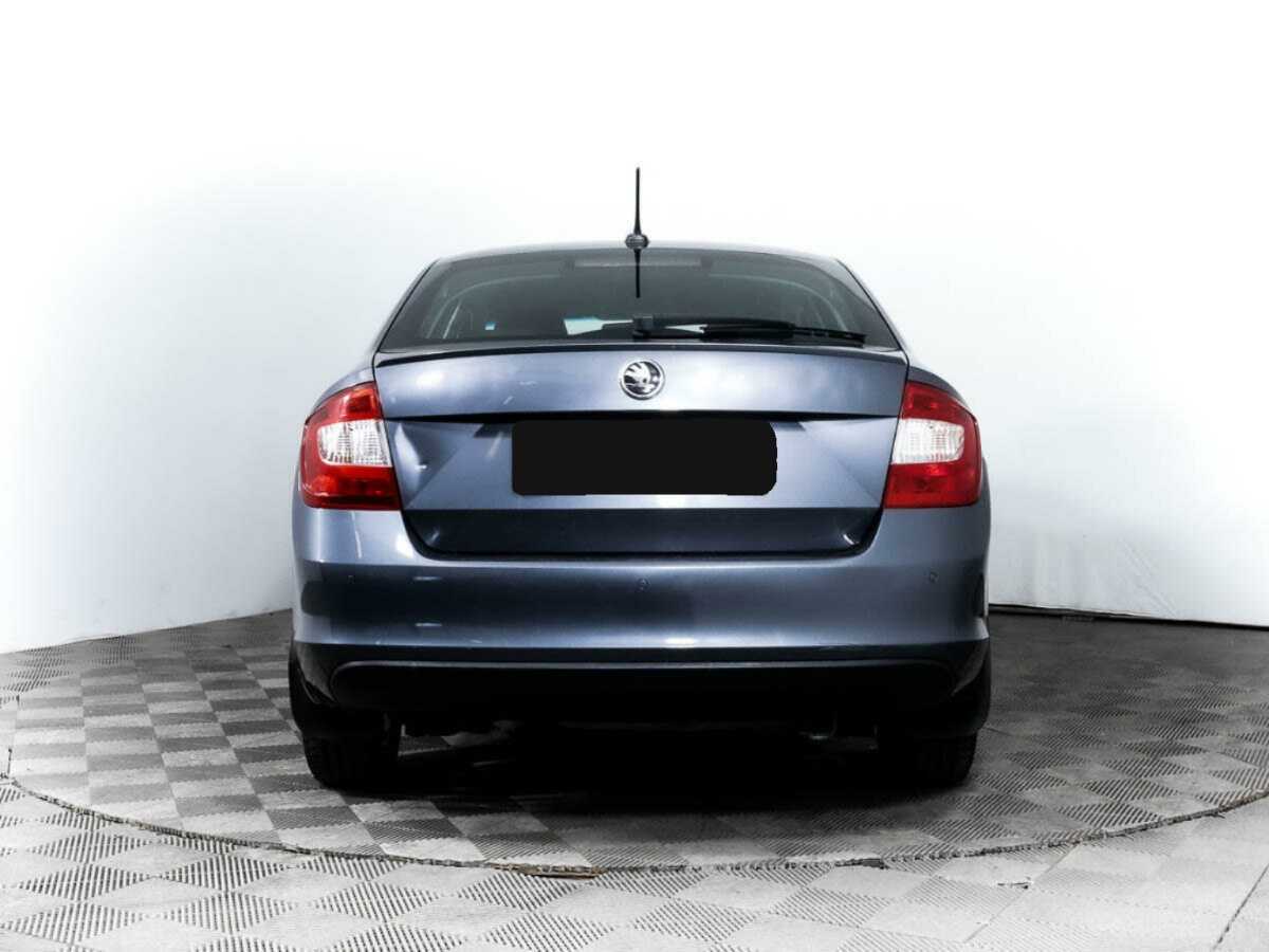 Skoda Rapid с пробегом — 2014 год. Фото: #4