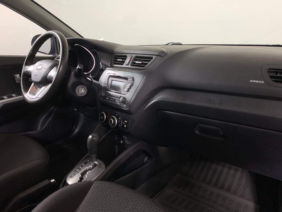 Kia Rio с пробегом — 2013 год. Фото: #11