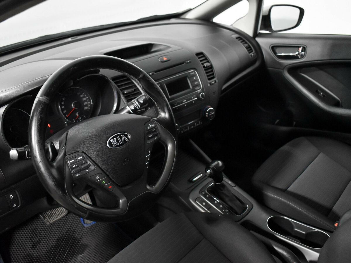 Kia Cerato с пробегом — 2015 год. Фото: #7