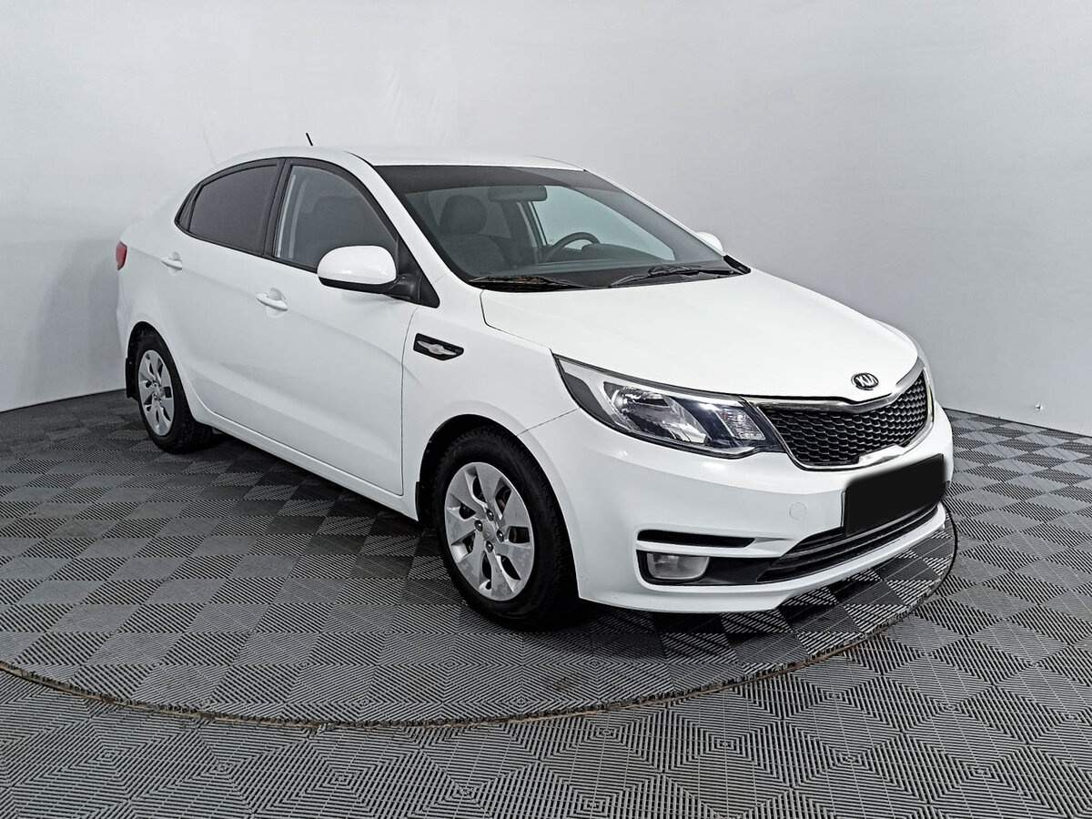 Kia Rio с пробегом — 2015 год. Фото: #2